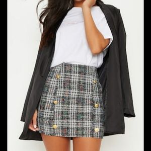 Black tweed button detail mini skirt